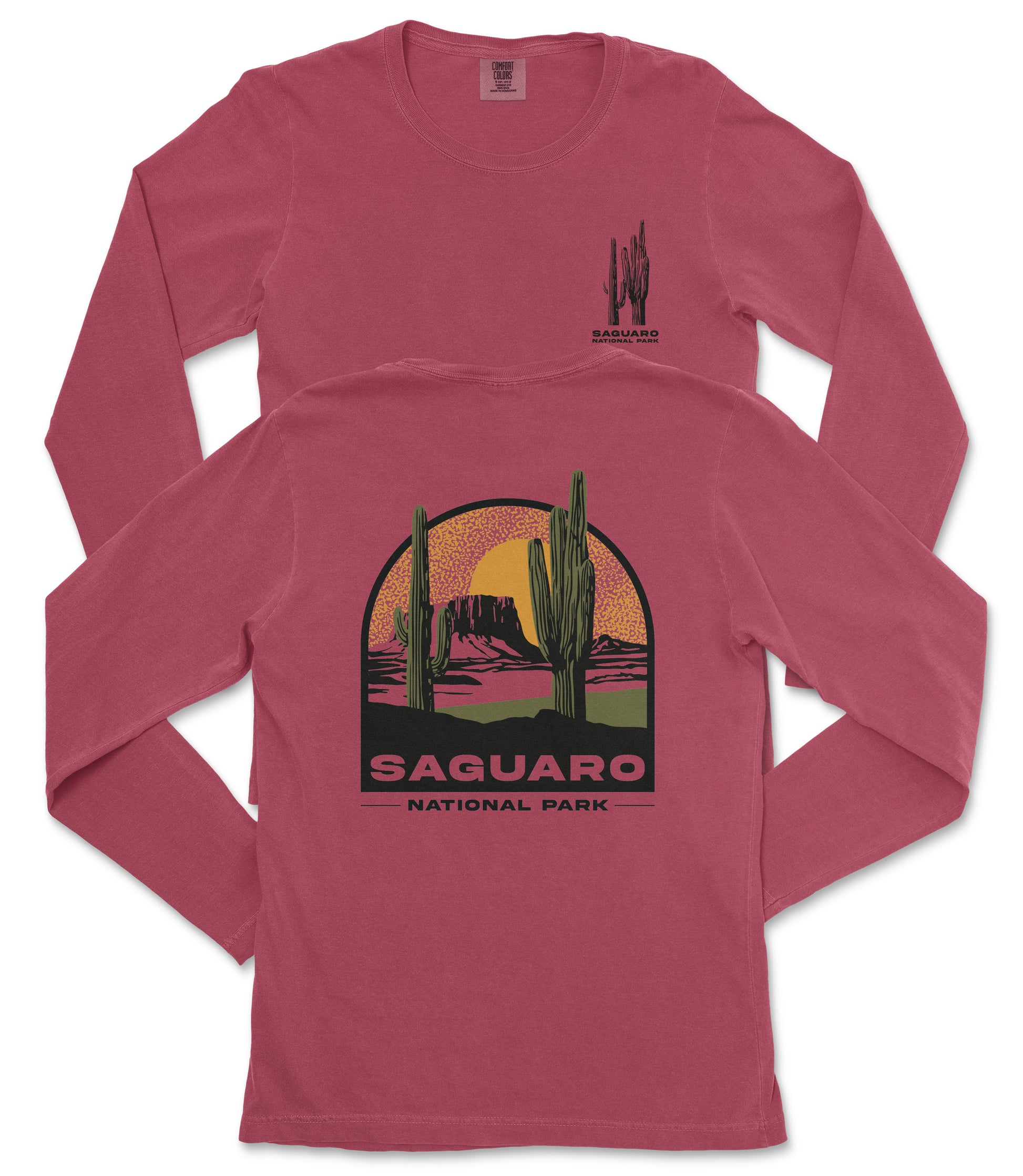 a red long-sleeved t-shirt with a graphic design depicting a desert landscape with cacti and mountains, along with the text "Saguaro National Park".