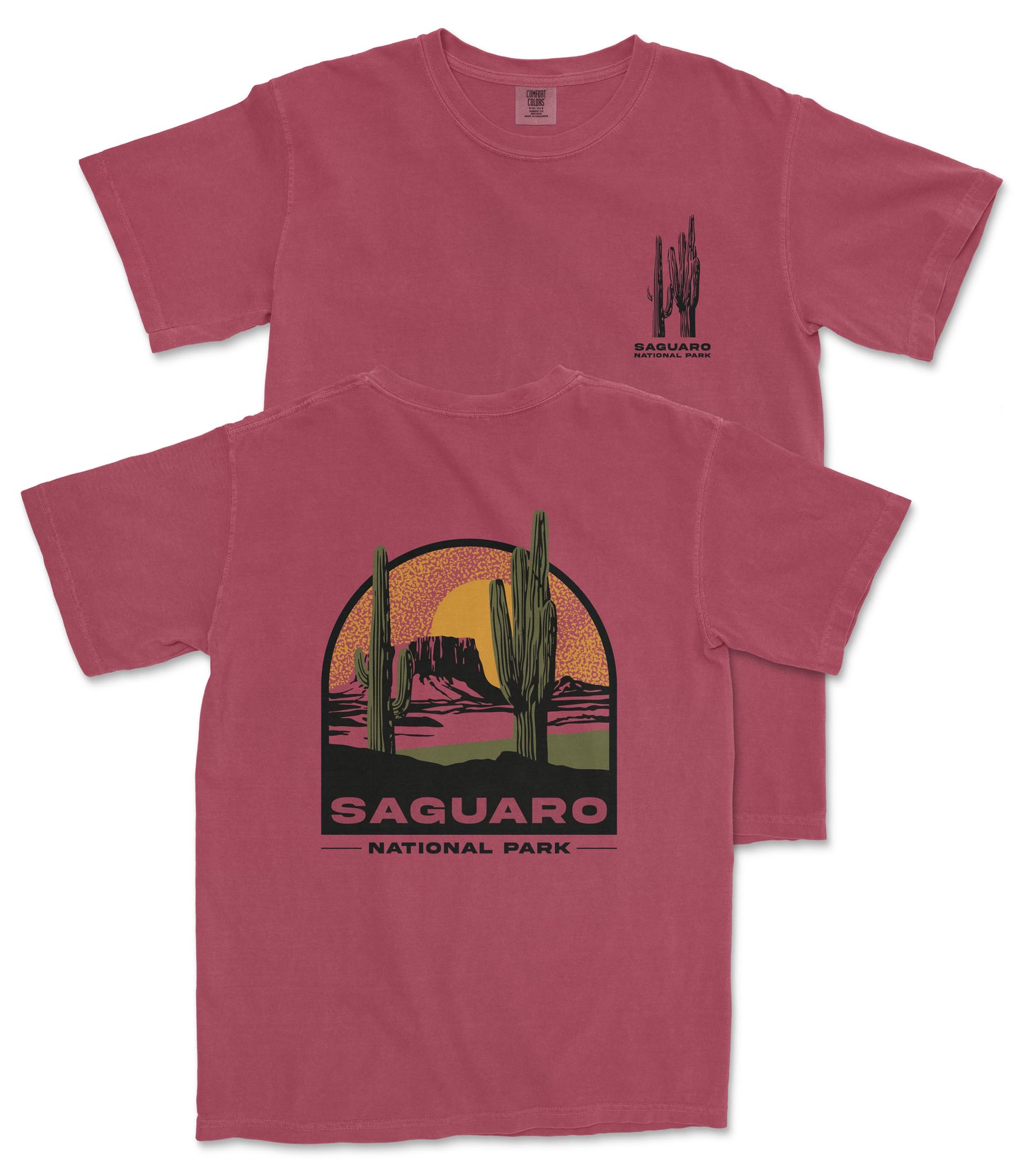 A red t-shirt with a graphic design depicting a desert landscape with cacti and mountains, along with the text "Saguaro National Park".