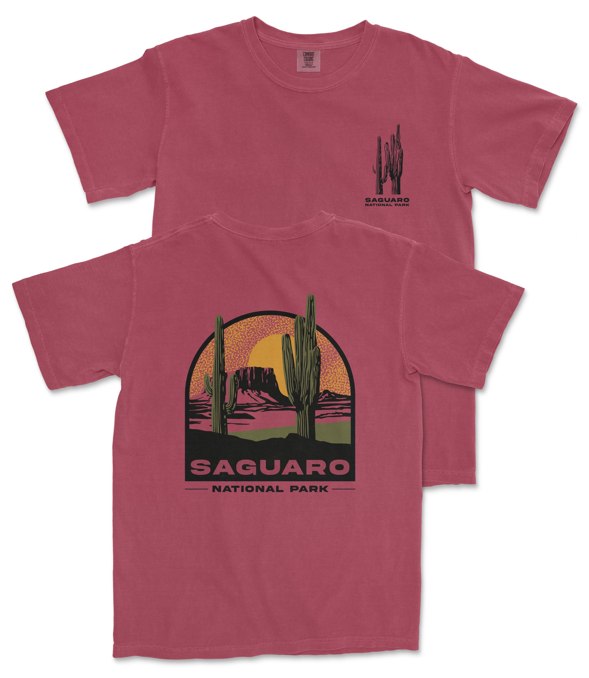 A red t-shirt with a graphic design depicting a desert landscape with cacti and mountains, along with the text "Saguaro National Park".