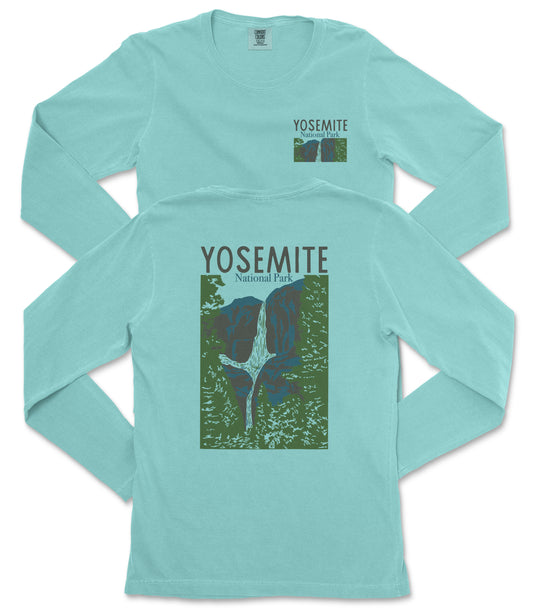 A light blue long-sleeved t-shirt with a graphic design depicting a waterfall and the text "Yosemite National Park" printed on it.