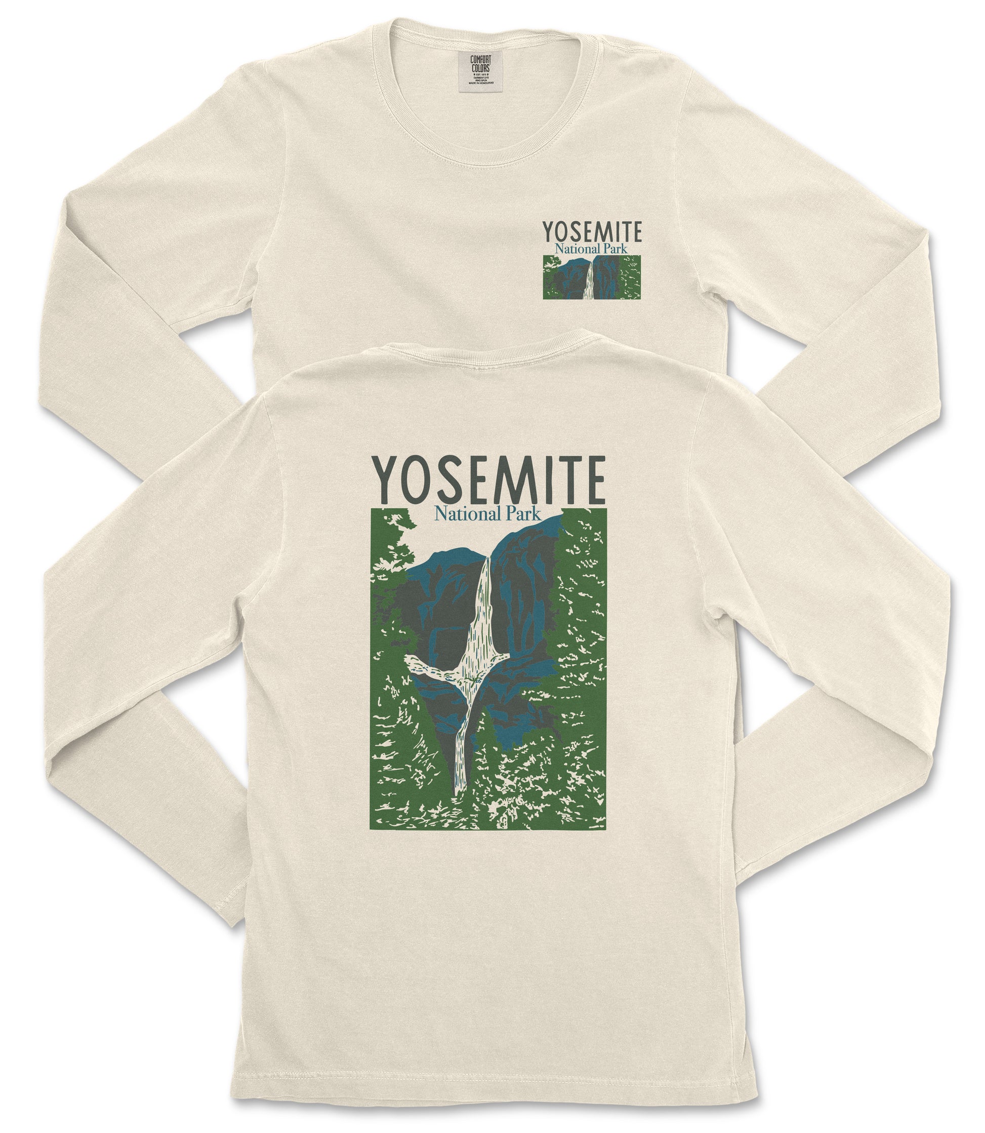 A white long-sleeved t-shirt with a graphic design depicting a waterfall and mountains, along with the text "Yosemite National Park" printed on it.