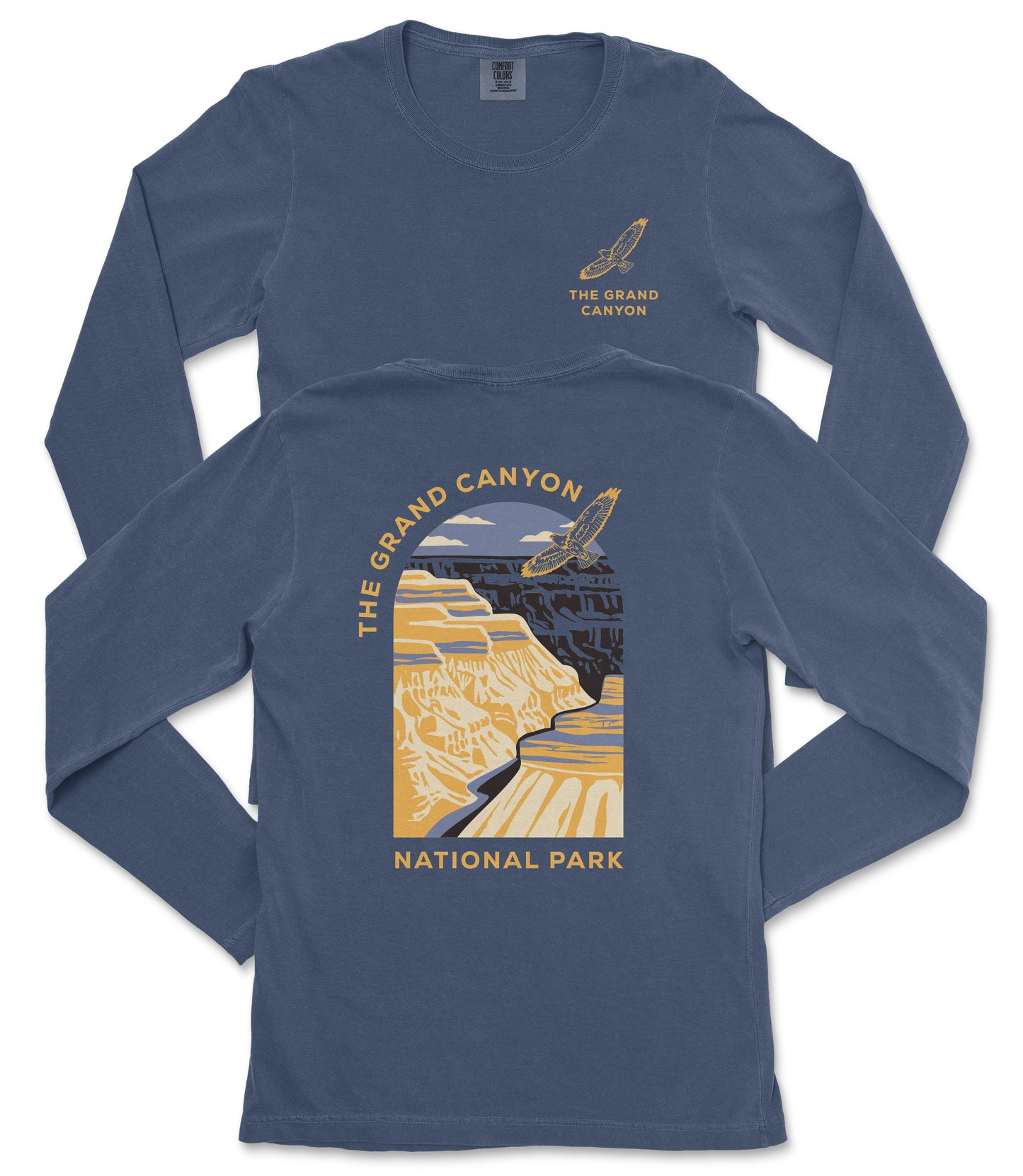 a long-sleeved blue t-shirt with a graphic design depicting the Grand Canyon.