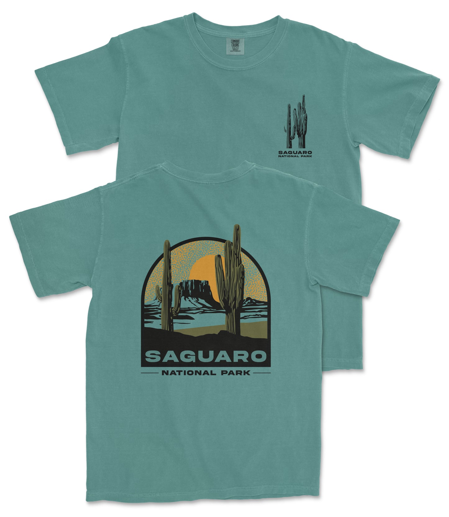 A turquoise t-shirt with a graphic design depicting a desert landscape with cacti and mountains, along with the text "Saguaro National Park".