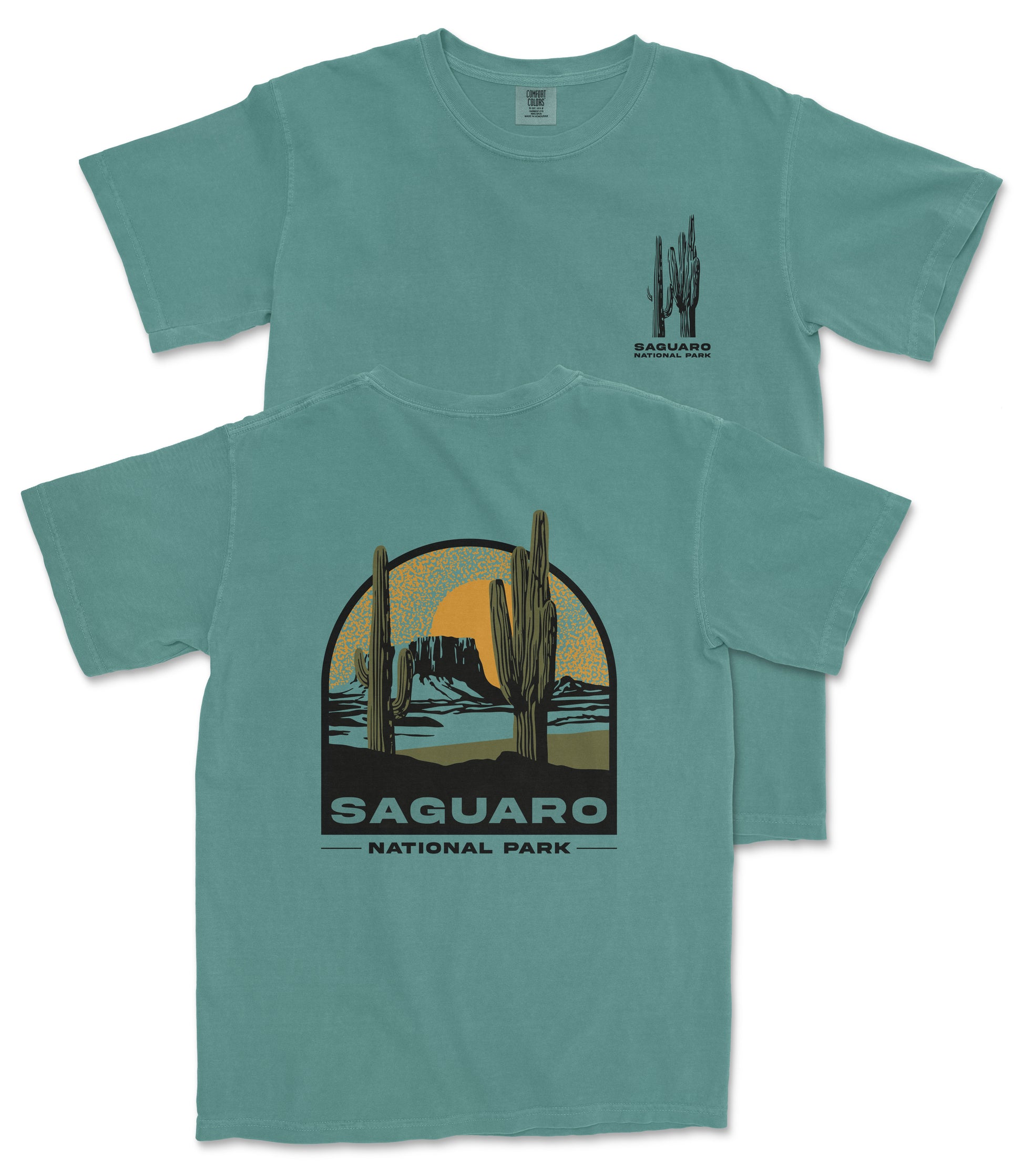 A turquoise t-shirt with a graphic design depicting a desert landscape with cacti and mountains, along with the text "Saguaro National Park".