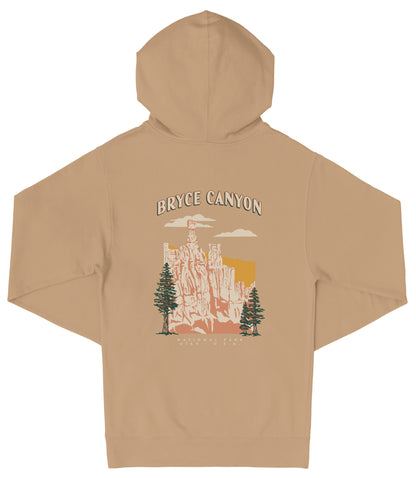 A beige hooded sweatshirt with a graphic design depicting the Bryce Canyon National Park.