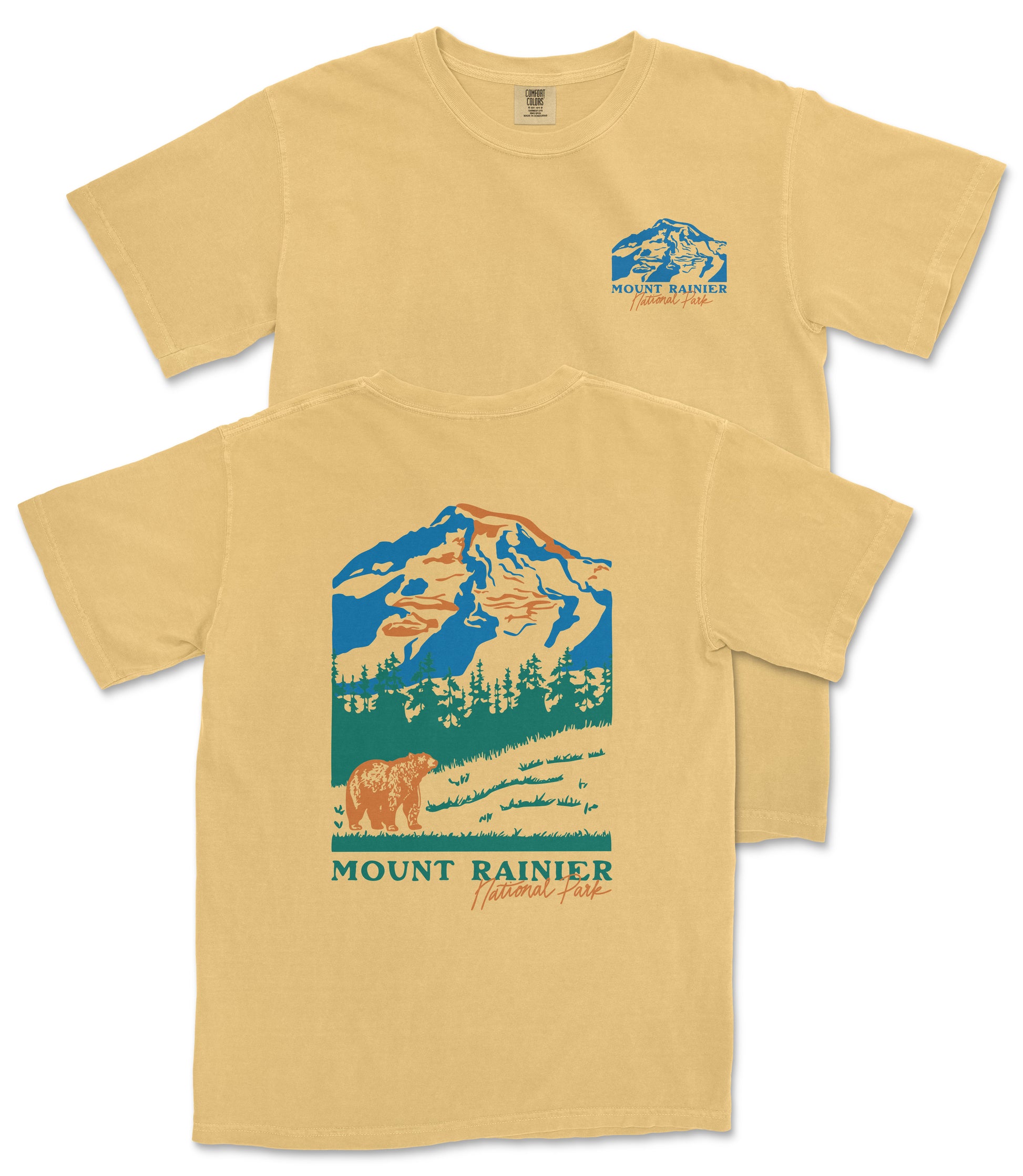 A yellow t-shirt with a graphic design depicting a mountain landscape, featuring a bear and the text "Mount Rainier National Park".