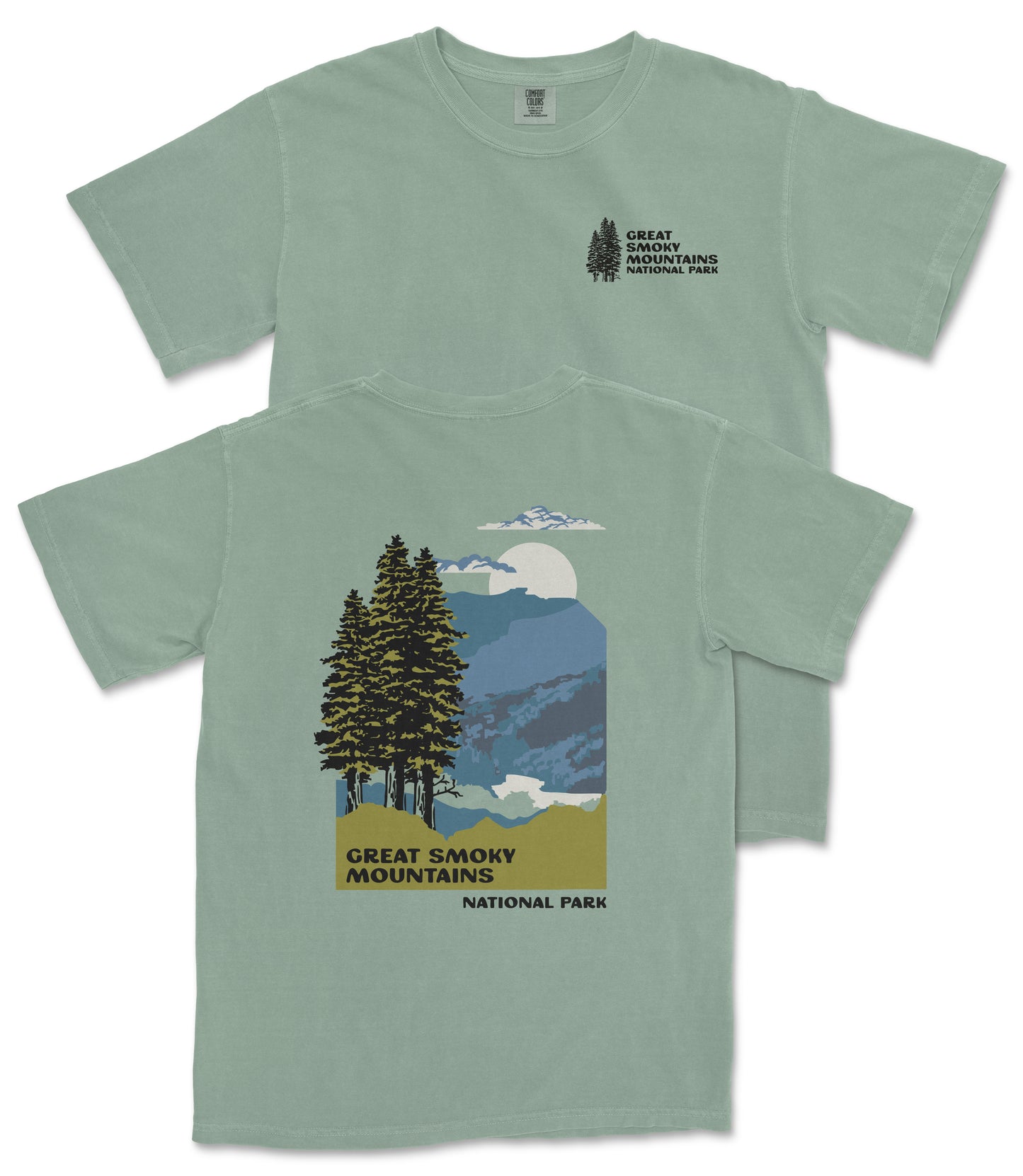 A green t-shirt with a graphic design depicting a mountain landscape with pine trees, a full moon, and clouds. The text on the t-shirt reads "GREAT SMOKY MOUNTAINS NATIONAL PARK".