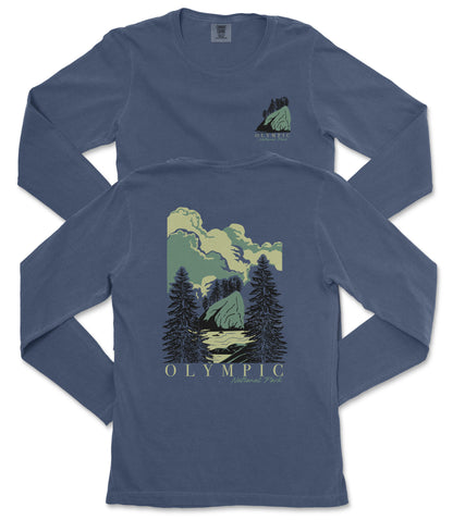 A long-sleeved blue t-shirt with a graphic design depicting a mountain landscape with pine trees and clouds.