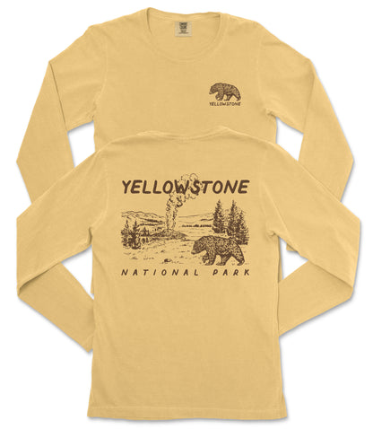 A yellow long-sleeved t-shirt with a graphic design depicting a bear and a landscape, along with the text "Yellowstone National Park" printed on it.