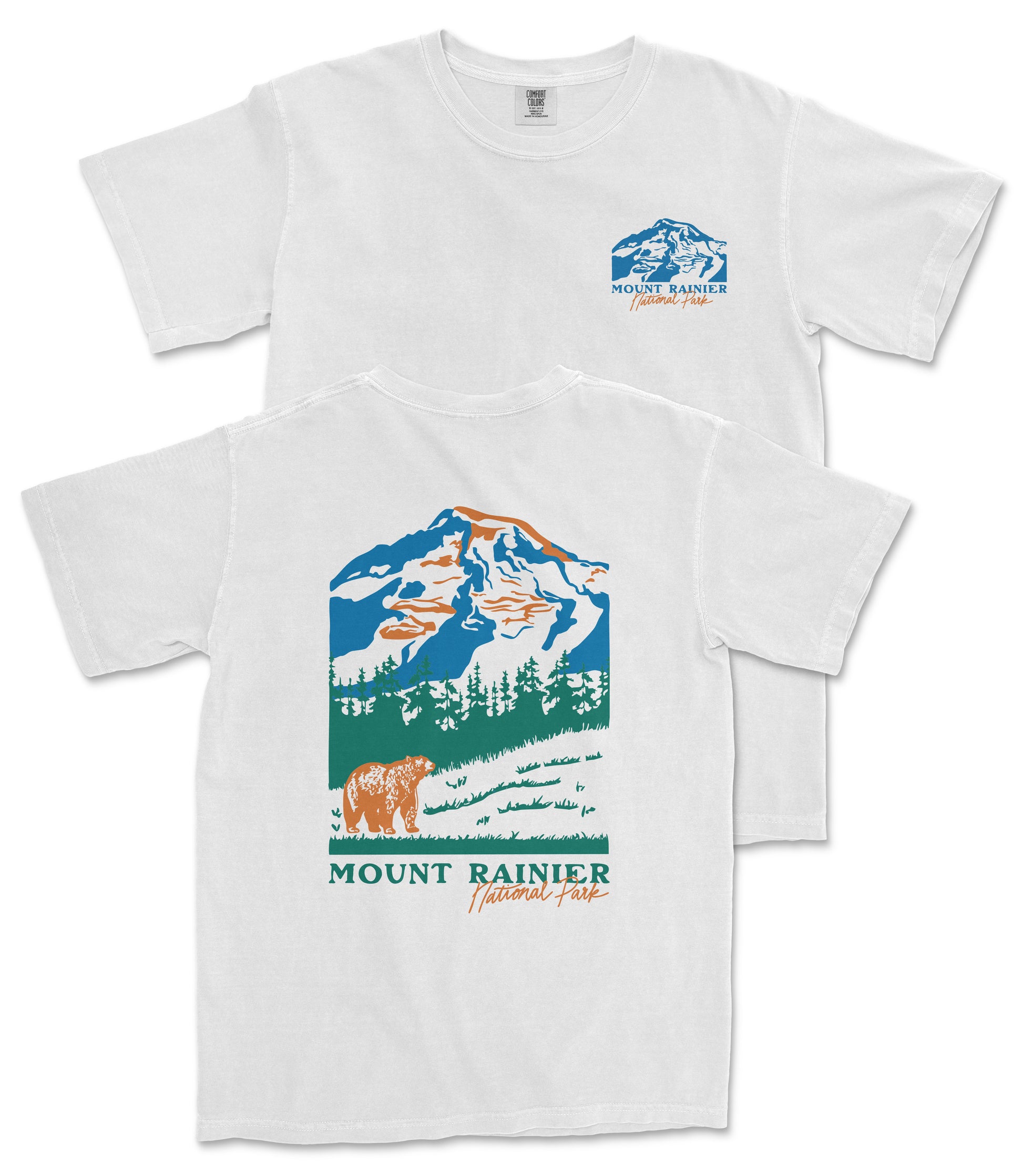 A white t-shirt with a graphic design depicting a mountain landscape, including a bear and trees, along with the text "Mount Rainier National Forest".
