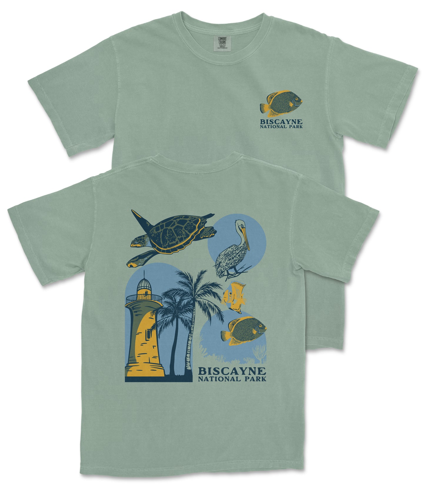 A green t-shirt with a graphic design depicting various elements associated with Biscayne National Park, including a lighthouse, palm trees, and tropical birds.