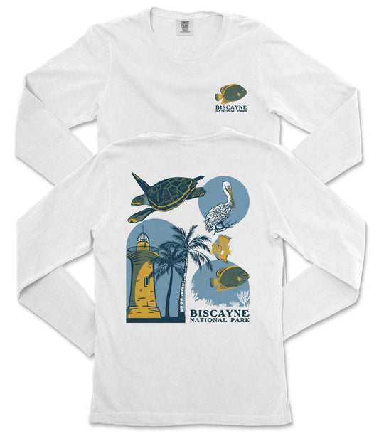 A white long-sleeved t-shirt with a graphic design depicting various marine life and landmarks, including a lighthouse, a turtle, a bird, and a palm tree.