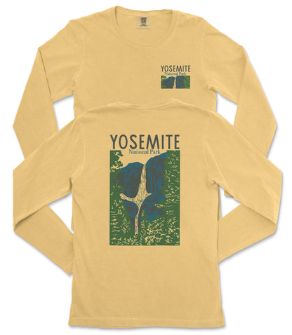 a yellow long-sleeved t-shirt with a graphic design depicting a mountain range and the text "Yosemite National Park" printed on it.