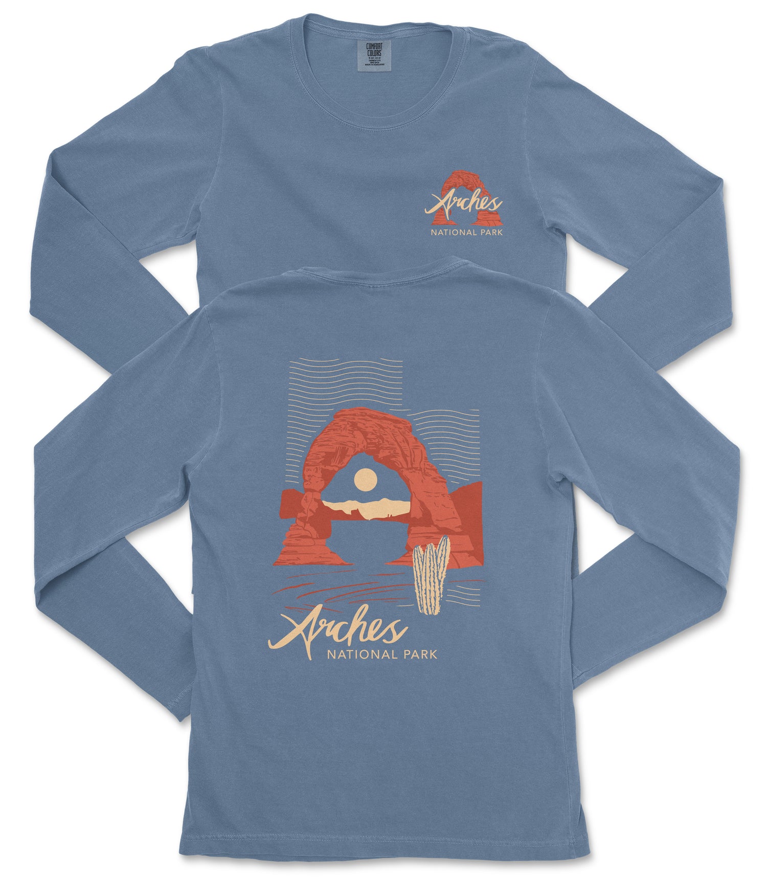 A long-sleeved blue t-shirt with a graphic design depicting a natural landscape, including a rock formation and a desert scene. The text "Arches National Park" is printed on the shirt.