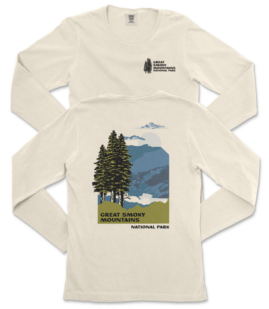 a white long-sleeved t-shirt with a graphic design depicting a mountain landscape with pine trees and mountains.