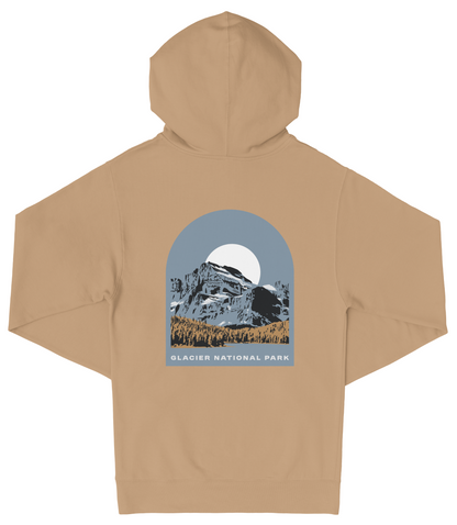 A beige hooded sweatshirt with a graphic design depicting a mountain landscape and a full moon.