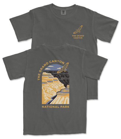 a gray t-shirt with a graphic design depicting a scenic view of the Grand Canyon National Park.