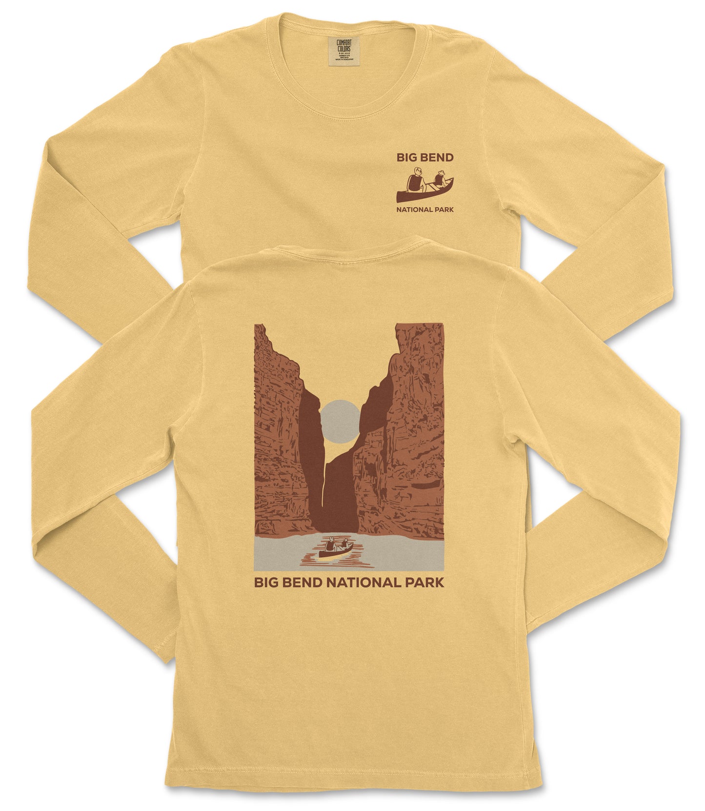 a yellow long-sleeved shirt with a graphic design depicting a canyon and a boat on a river.