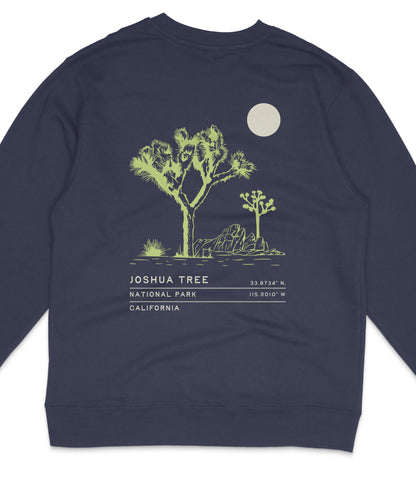 A dark blue sweatshirt with a graphic design depicting a Joshua tree and a full moon.