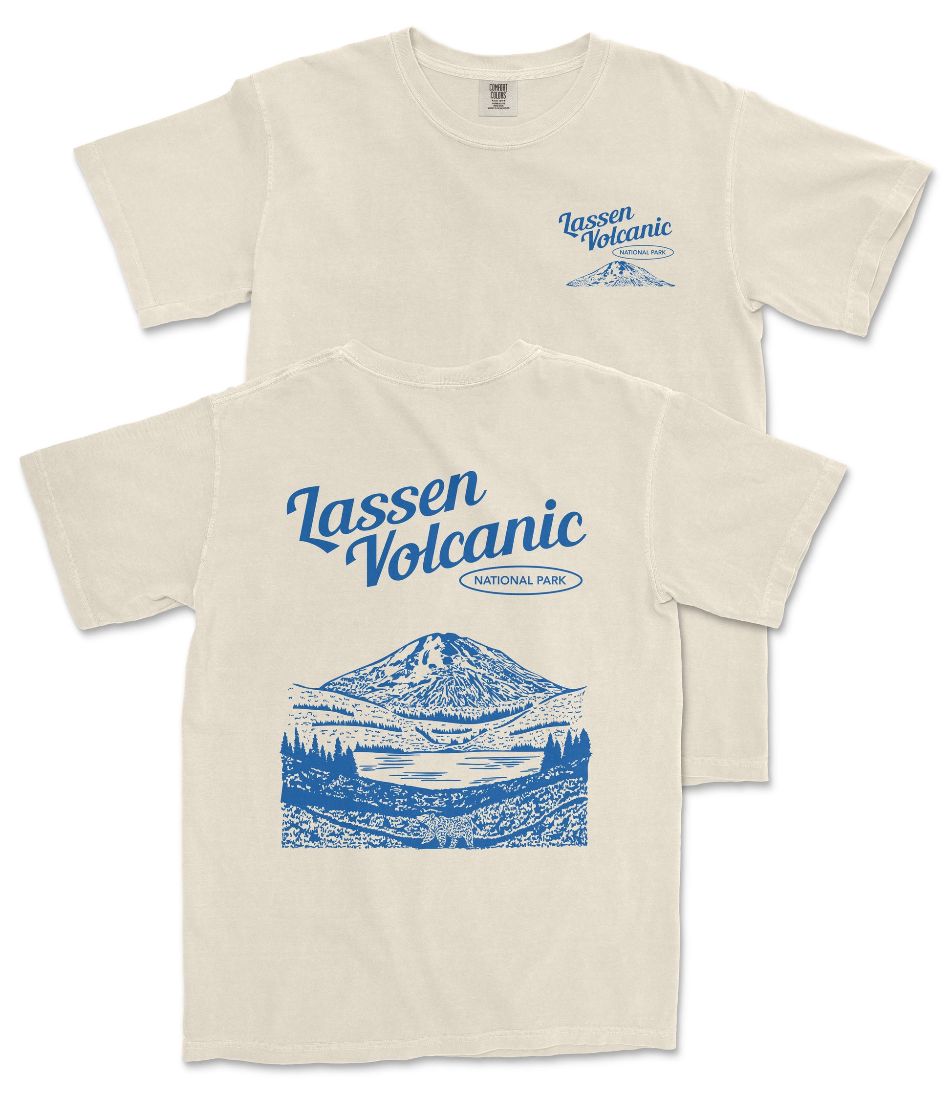 a cream-colored t-shirt with a graphic design depicting a mountain landscape, along with the text "Lassen Volcanic National Park" printed on it.