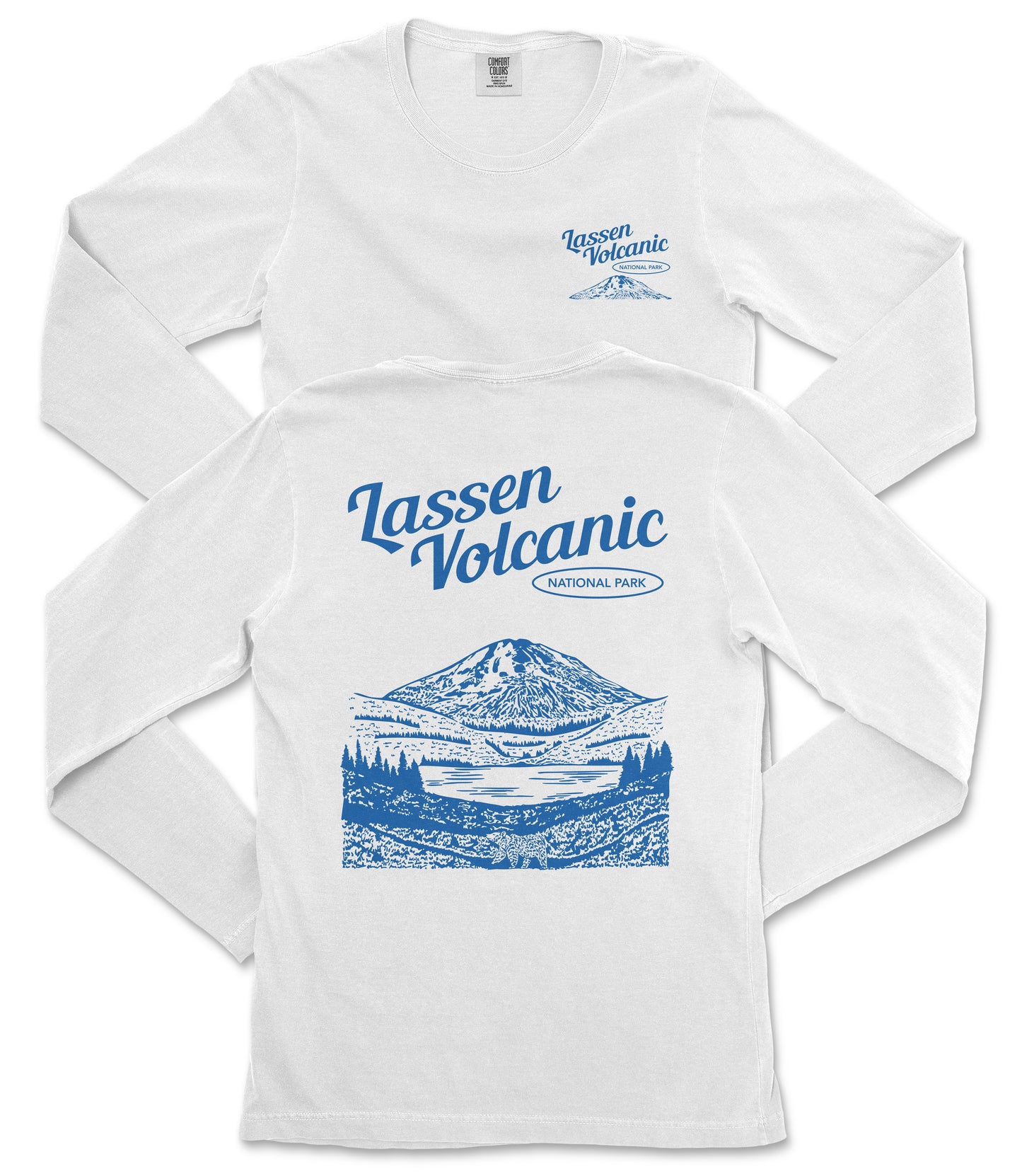 A white long-sleeved t-shirt with a graphic design depicting a mountain landscape and a lake, along with text that reads "Lassen Volcanic National Park".