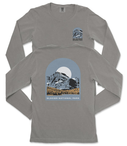 a gray long-sleeved t-shirt with a graphic design depicting a mountain landscape and a full moon.
