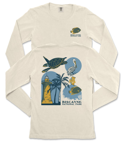 a white long-sleeved t-shirt with a graphic design depicting various marine life and landmarks, including a lighthouse, a turtle, a bird, and a palm tree.