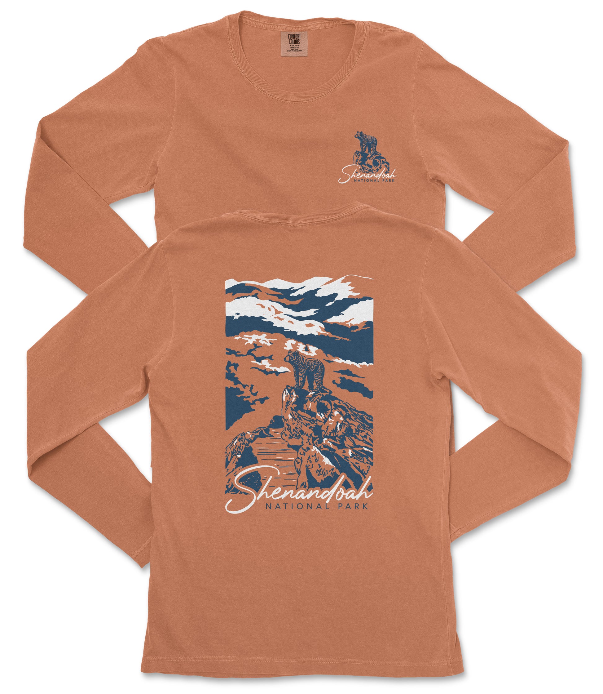 a long-sleeved orange t-shirt with a graphic design depicting a mountain landscape and a bear. The text "Shenandoah National Park" is printed on the back of the shirt.