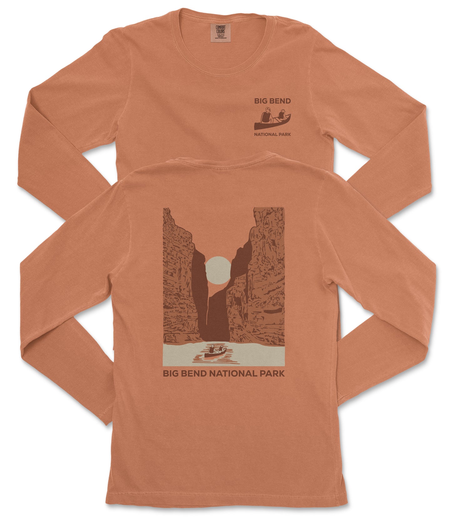 a long-sleeved orange t-shirt with a graphic design depicting a canyon landscape and a boat on a river. The text on the t-shirt reads "BIG BEND NATIONAL PARK".