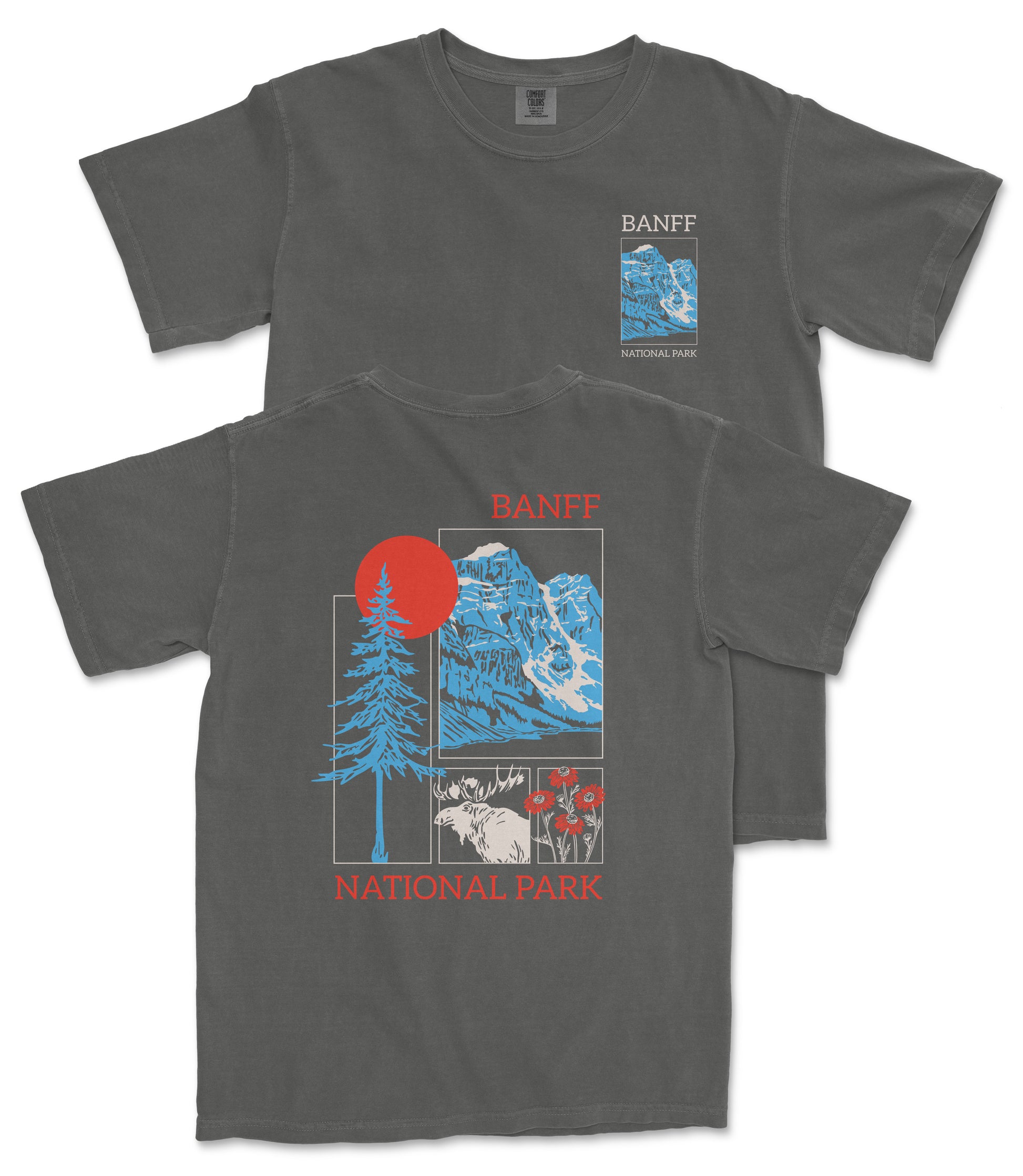 a gray t-shirt with a graphic design depicting a mountain landscape, including a sun, pine trees, and wildlife. The text on the t-shirt reads "BANFF NATIONAL PARK" and "BANFF" is written in a larger font size than the rest of the text.