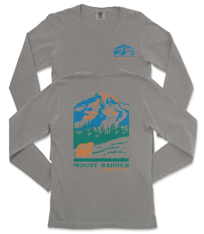 a gray long-sleeved t-shirt with a graphic design depicting a mountain landscape, including a bear and trees. The text "MOUNT RAINIER" is printed below the mountain graphic.
