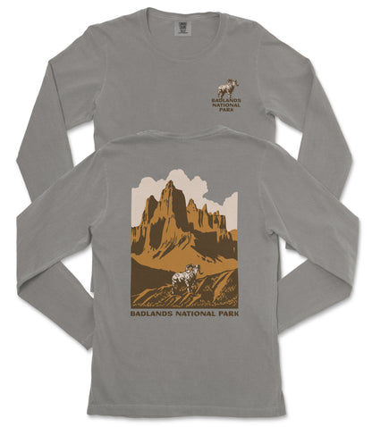 a gray long-sleeved t-shirt with a graphic design depicting a mountain landscape and a bighorn sheep.