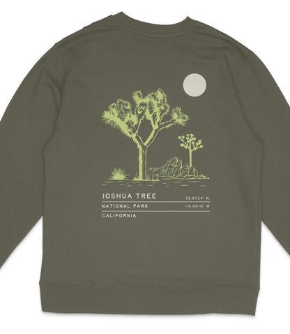 A grey sweatshirt with a graphic design depicting a Joshua tree and a moon on the back.