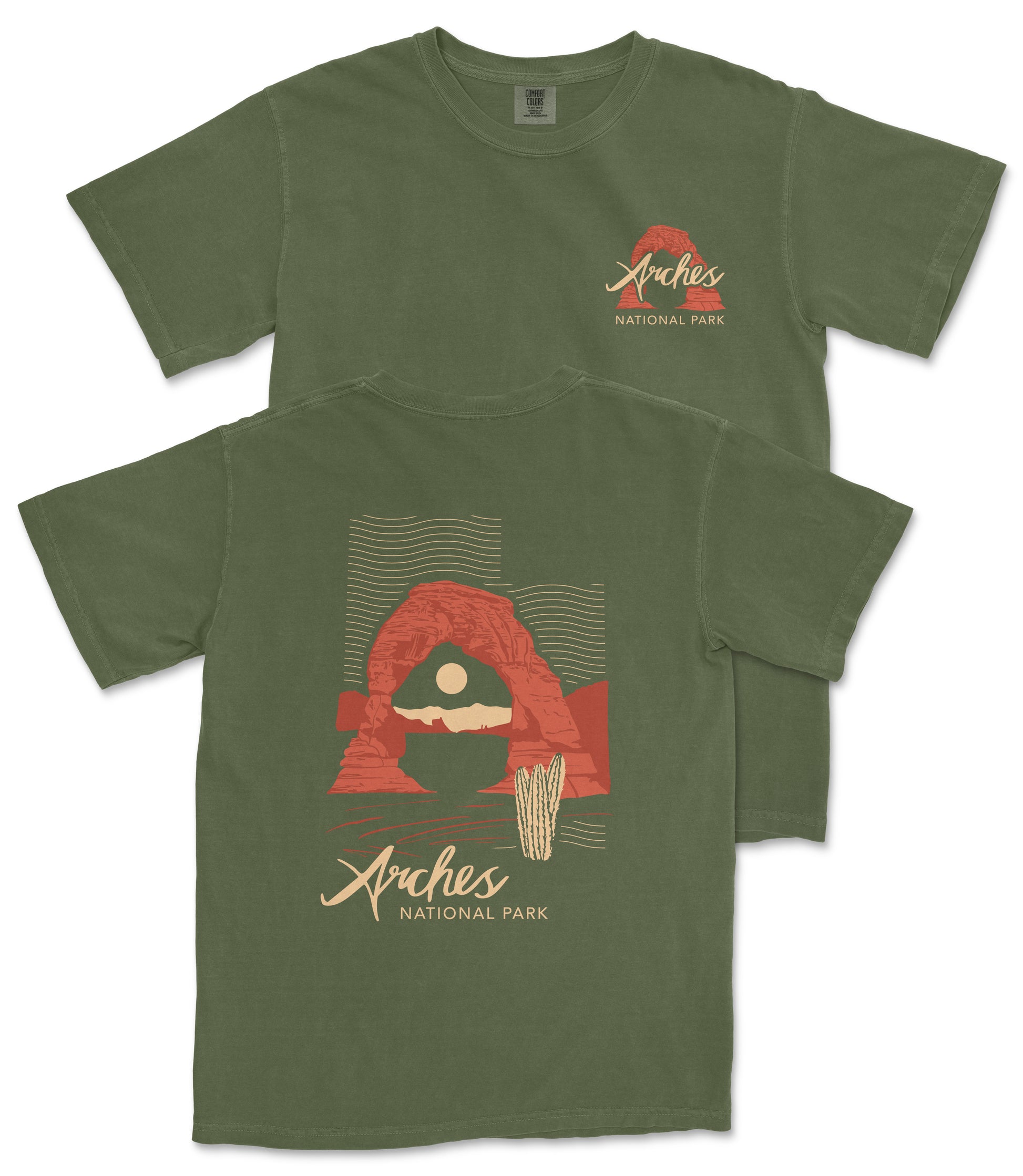 a green t-shirt with a graphic design depicting a desert landscape with a red rock formation and a cactus plant. The text on the t-shirt reads "Arches National Park".