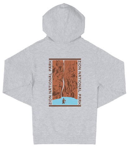 A gray hooded sweatshirt with a graphic design depicting a waterfall and a person standing in the water.