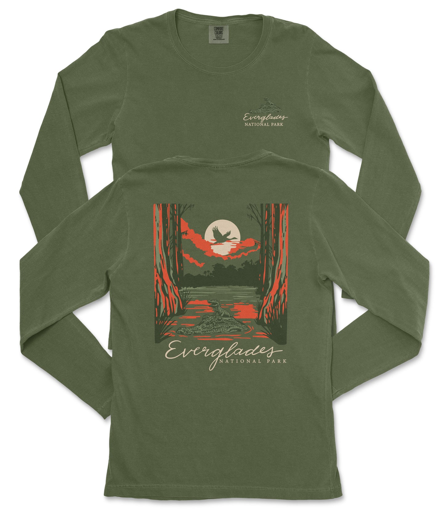 a green long-sleeved t-shirt with a graphic design depicting a sunset over a forest.