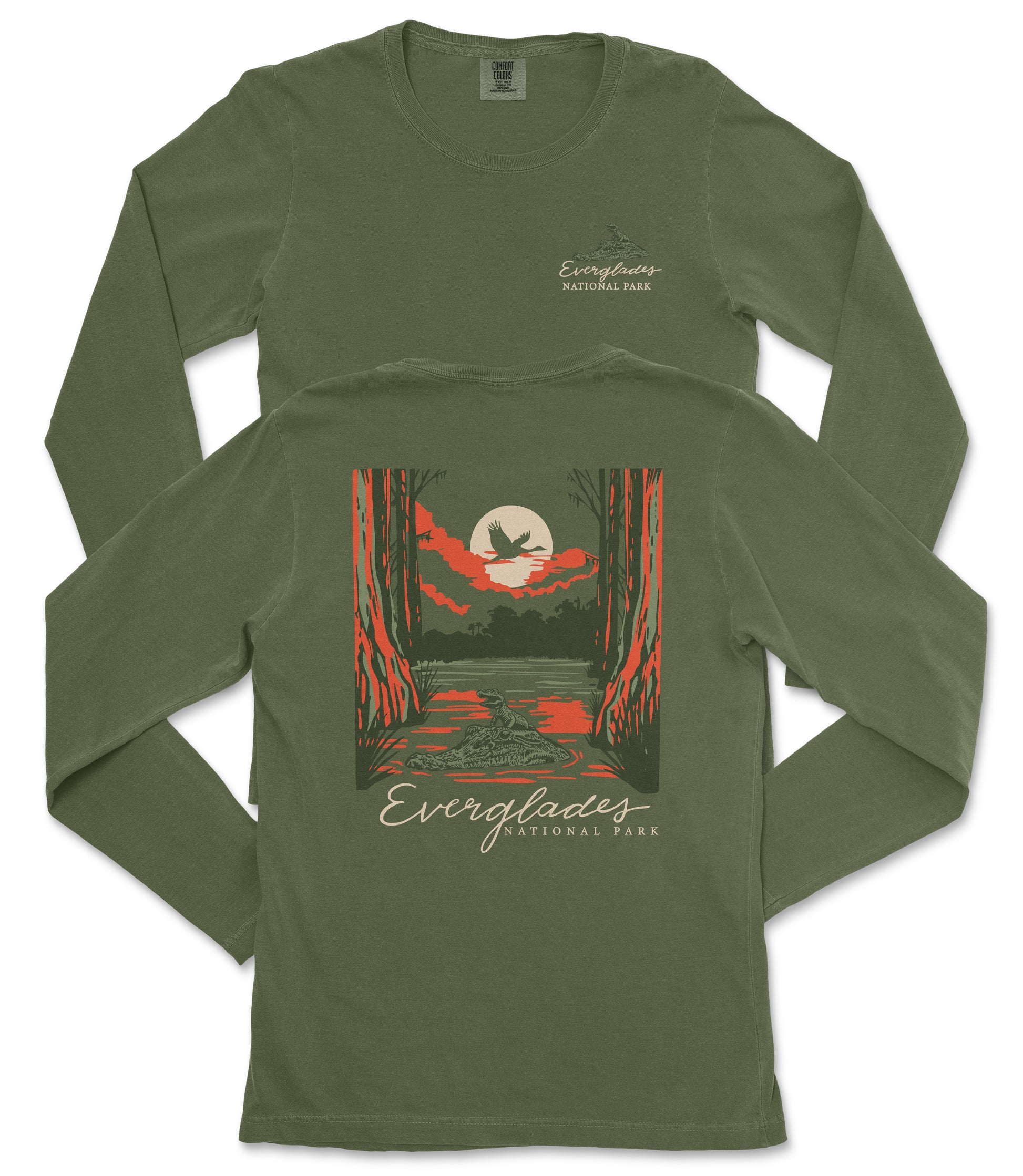 a green long-sleeved t-shirt with a graphic design depicting a sunset over a forest.