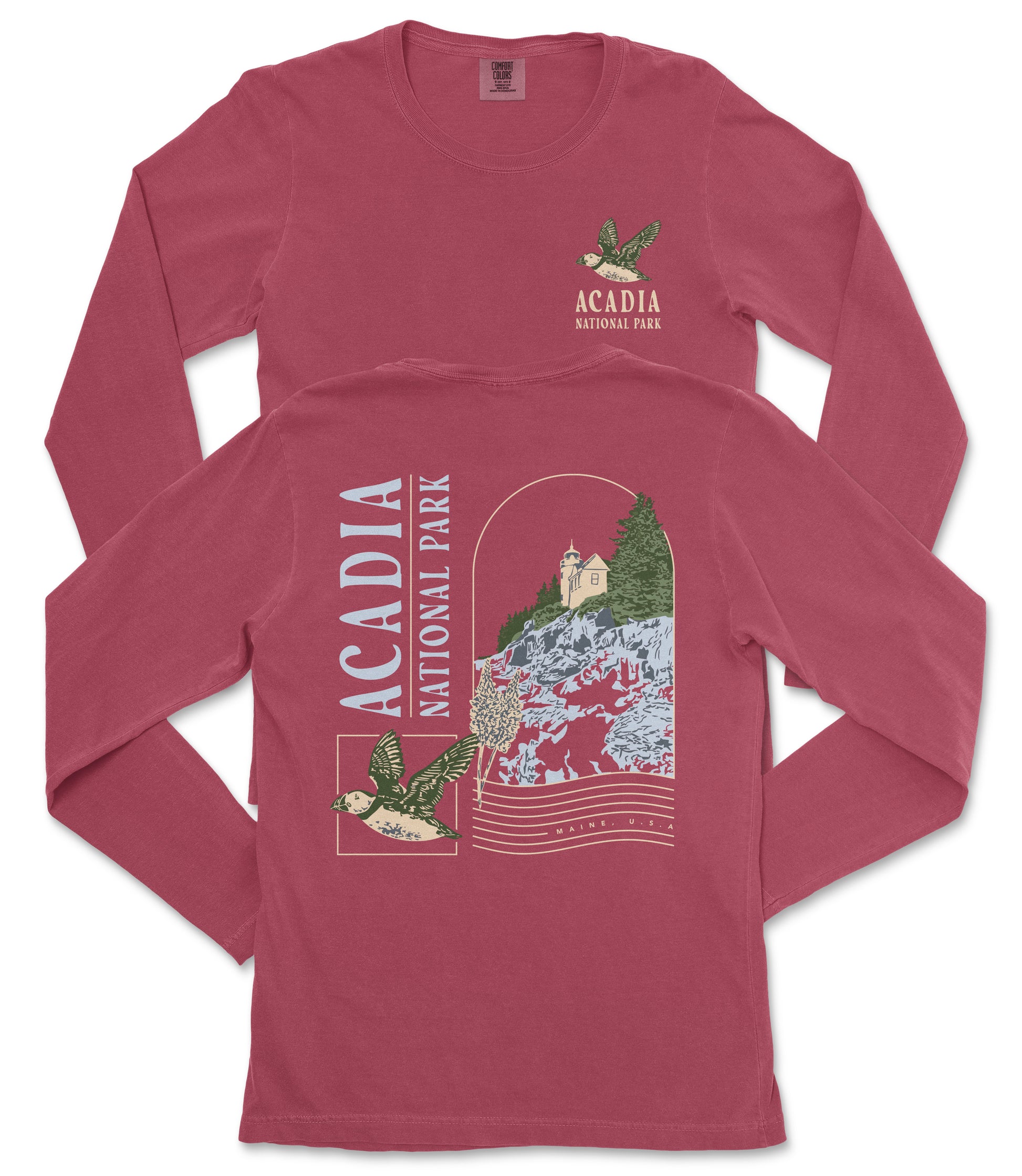 A red long-sleeved t-shirt with the text "ACADIA NATIONAL PARK" printed on it, along with an illustration of a bird and a landscape scene.