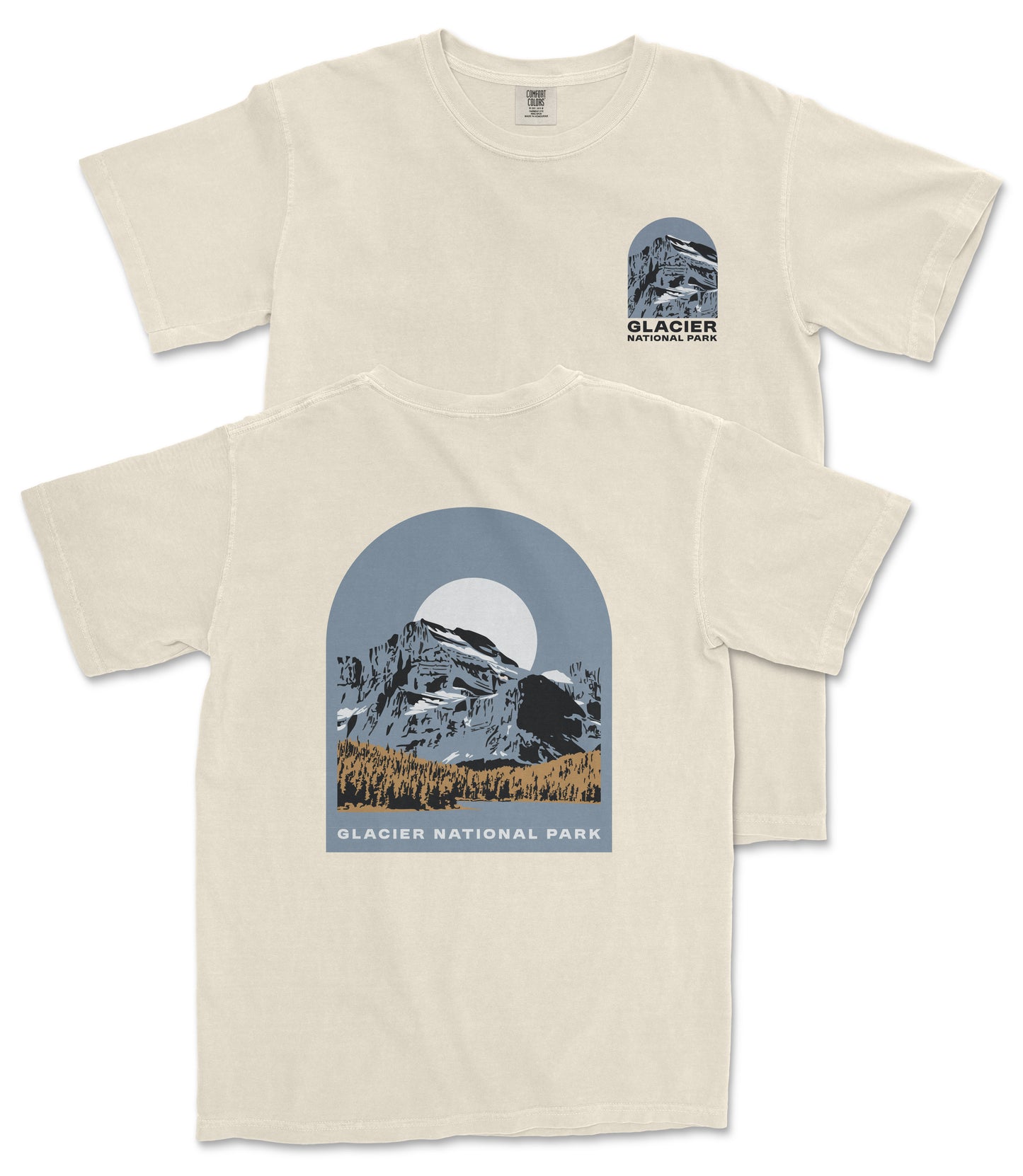 A cream-colored t-shirt with a graphic design depicting a mountain landscape and the text "Glacier National Park" printed on it.