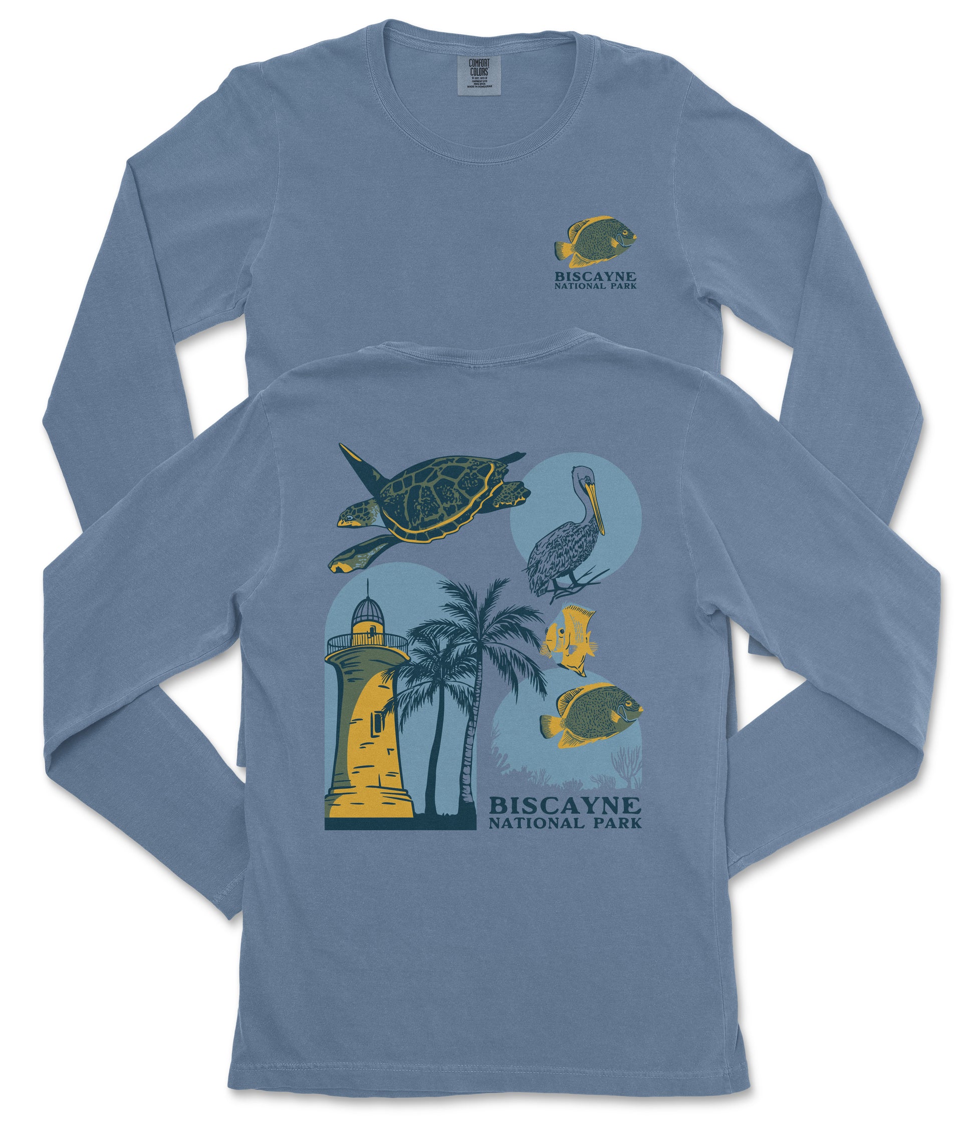 A long-sleeved blue t-shirt with a graphic design depicting various elements associated with Biscayne National Park, including a lighthouse, palm trees, and fish.
