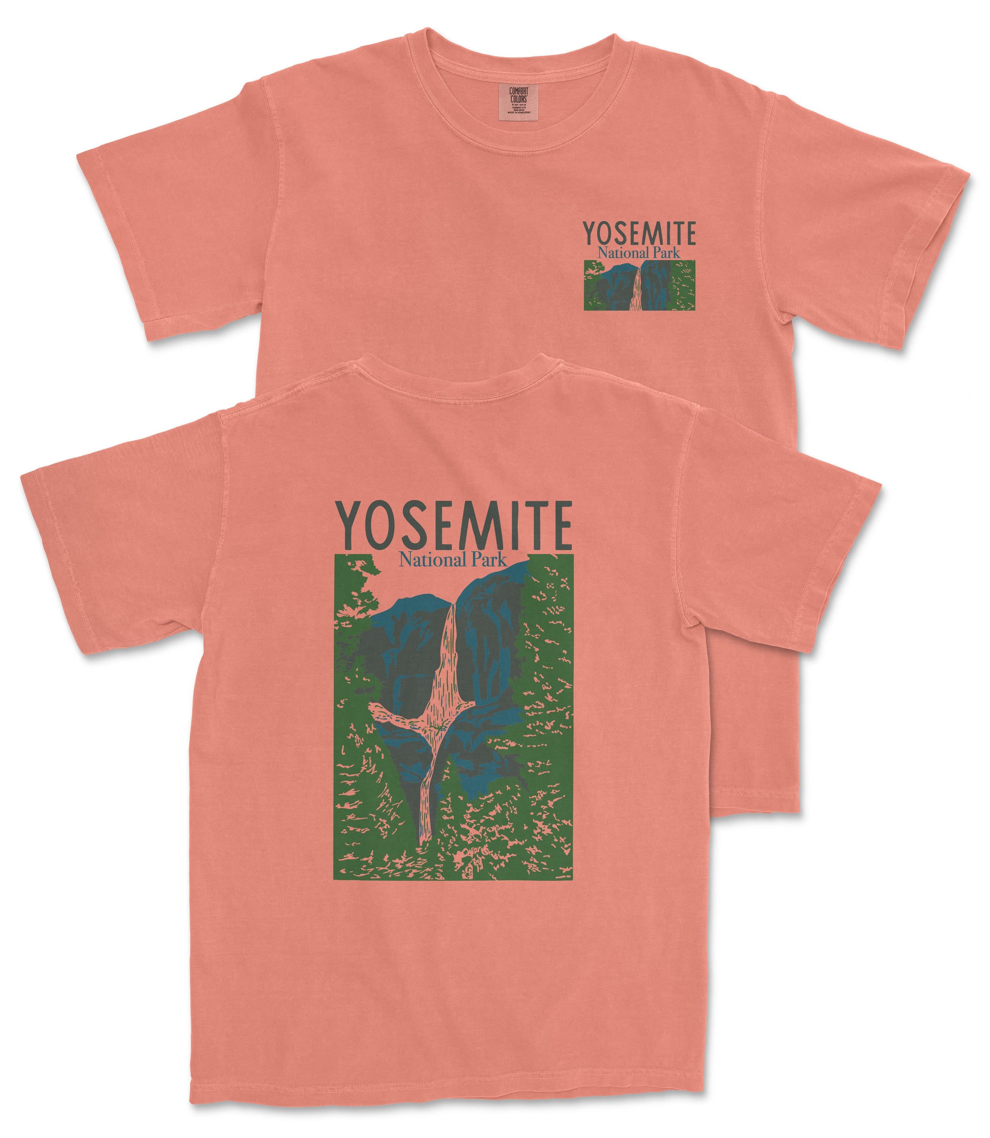 A peach-colored t-shirt with a graphic design depicting a mountain range and the text "Yosemite National Park" printed on it.