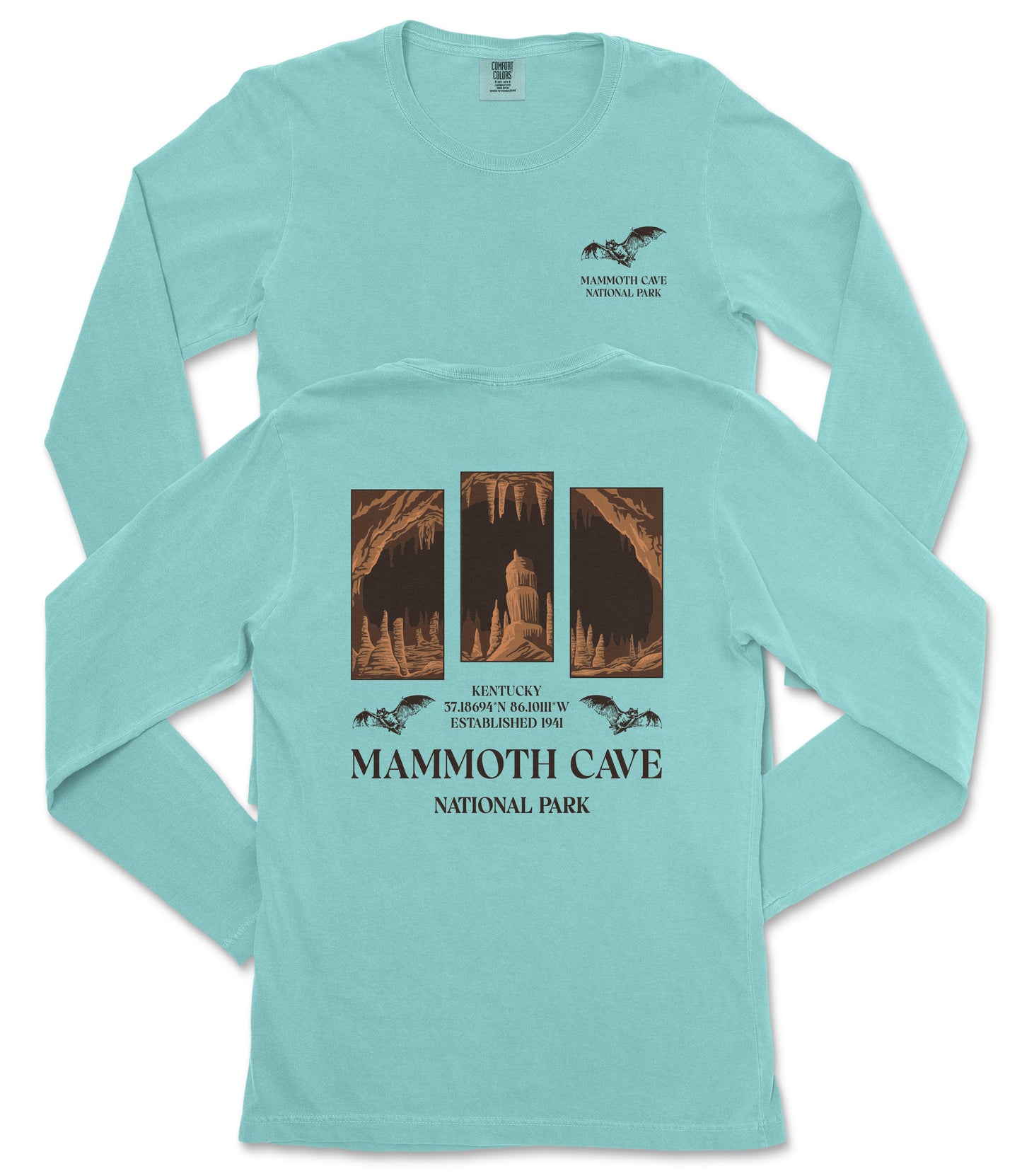A light blue long-sleeved t-shirt with a graphic design depicting the Mammoth Cave National Park in Kentucky.