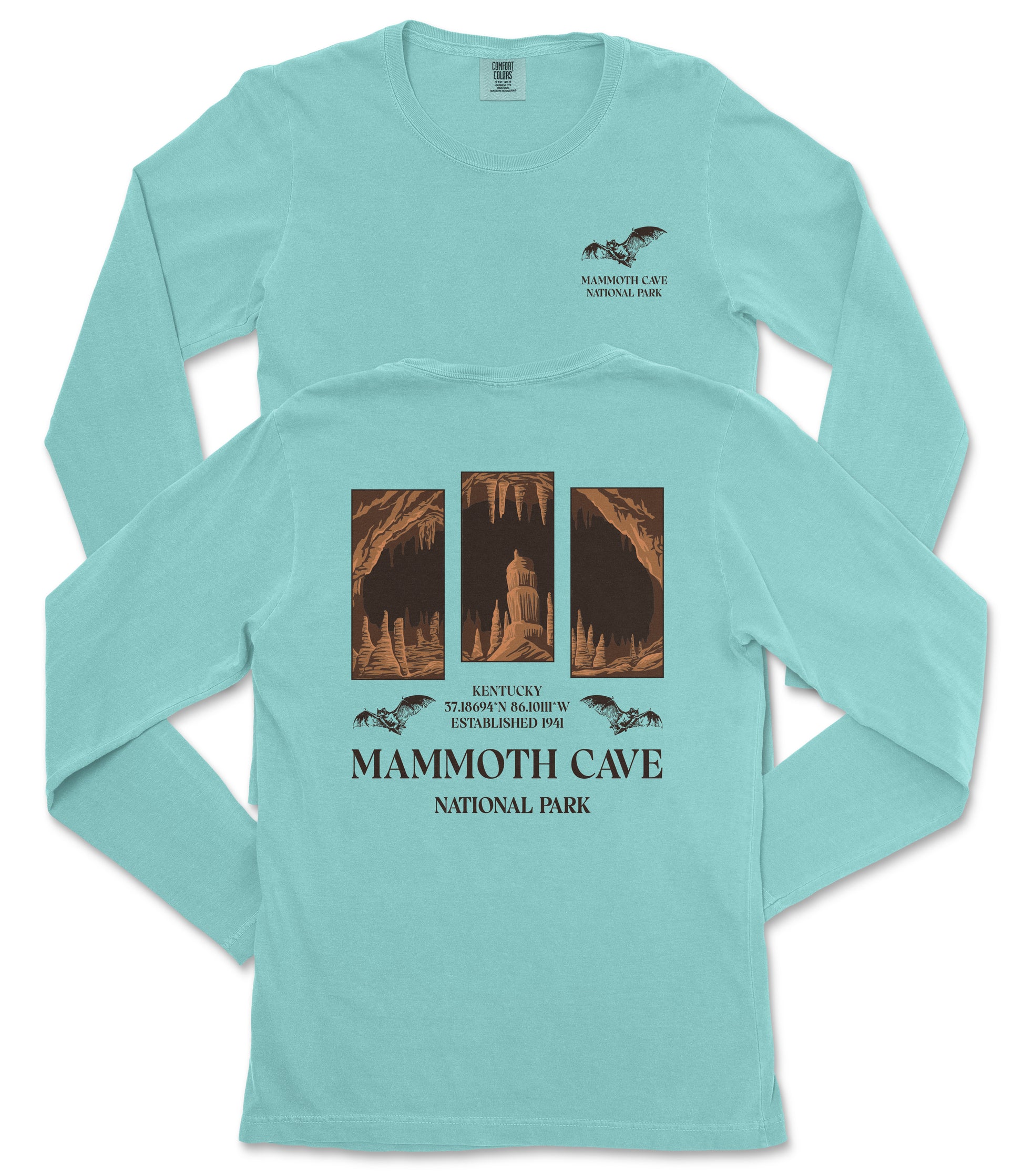 A light blue long-sleeved t-shirt with a graphic design depicting the Mammoth Cave National Park in Kentucky.