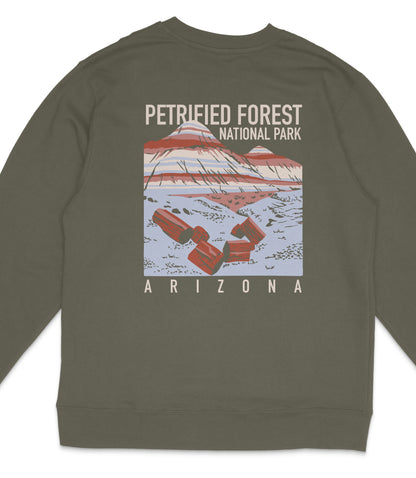 A gray sweatshirt with a graphic design depicting the Petrified Forest National Park in Arizona.