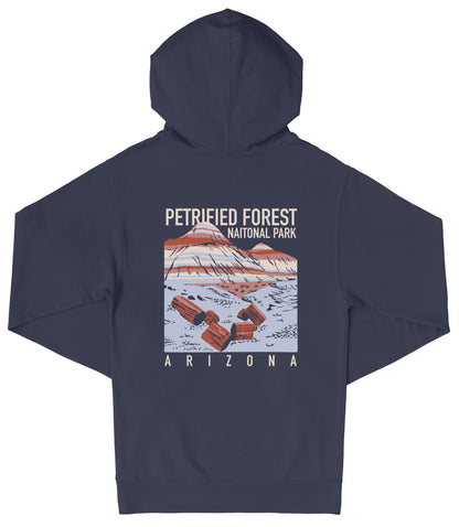 A navy blue hooded sweatshirt with a graphic design depicting a mountain range and the text "PETRIFIED FOREST NATIONAL PARK ARIZONA" printed on it.