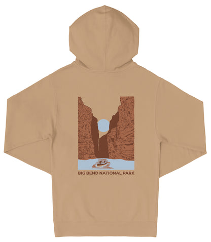A beige hooded sweatshirt with a graphic design depicting a canyon landscape and a boat on a river.