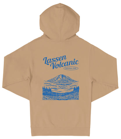A beige hooded sweatshirt with a graphic design depicting a mountain landscape and the text "Lassen Volcanic National Park" printed on the back.