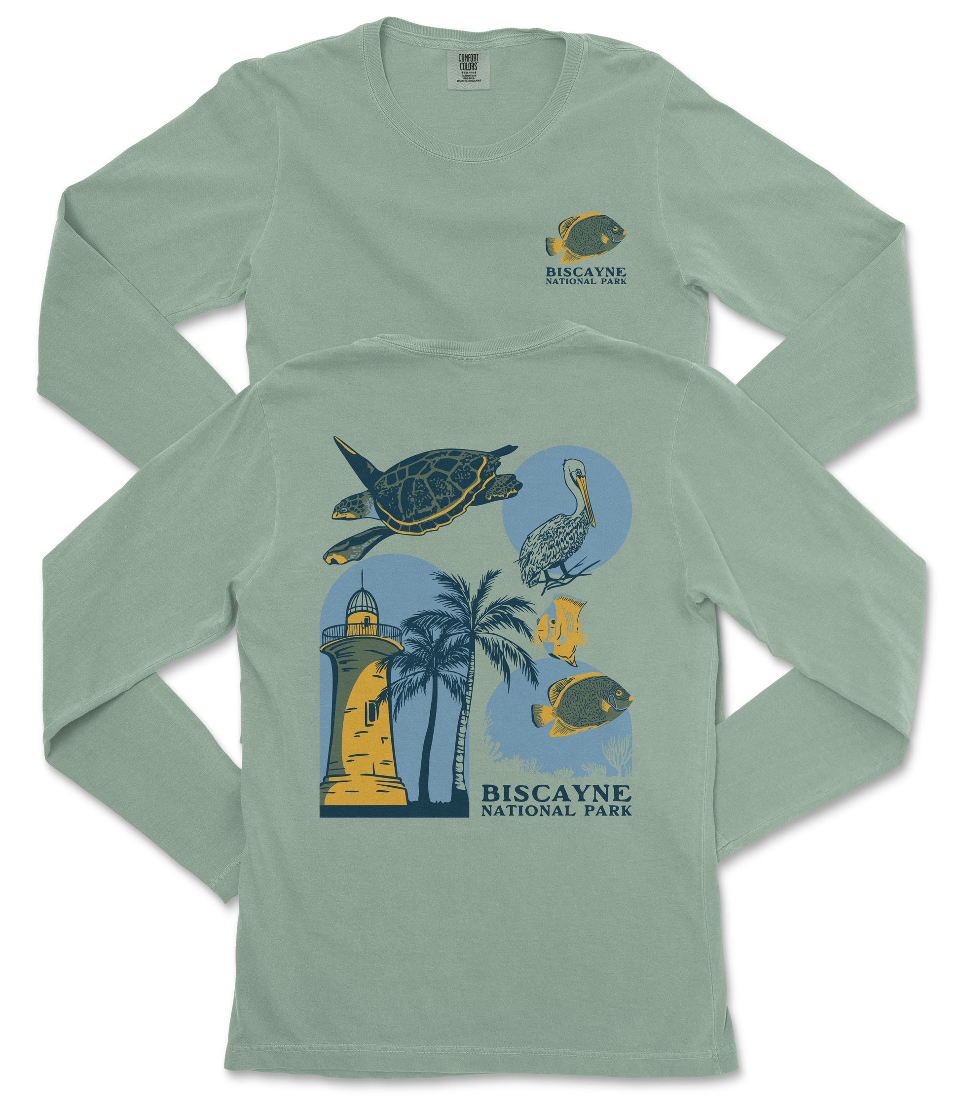 A green long-sleeved t-shirt with a graphic design depicting various marine life and landmarks, including a lighthouse, a turtle, a crane, and palm trees.