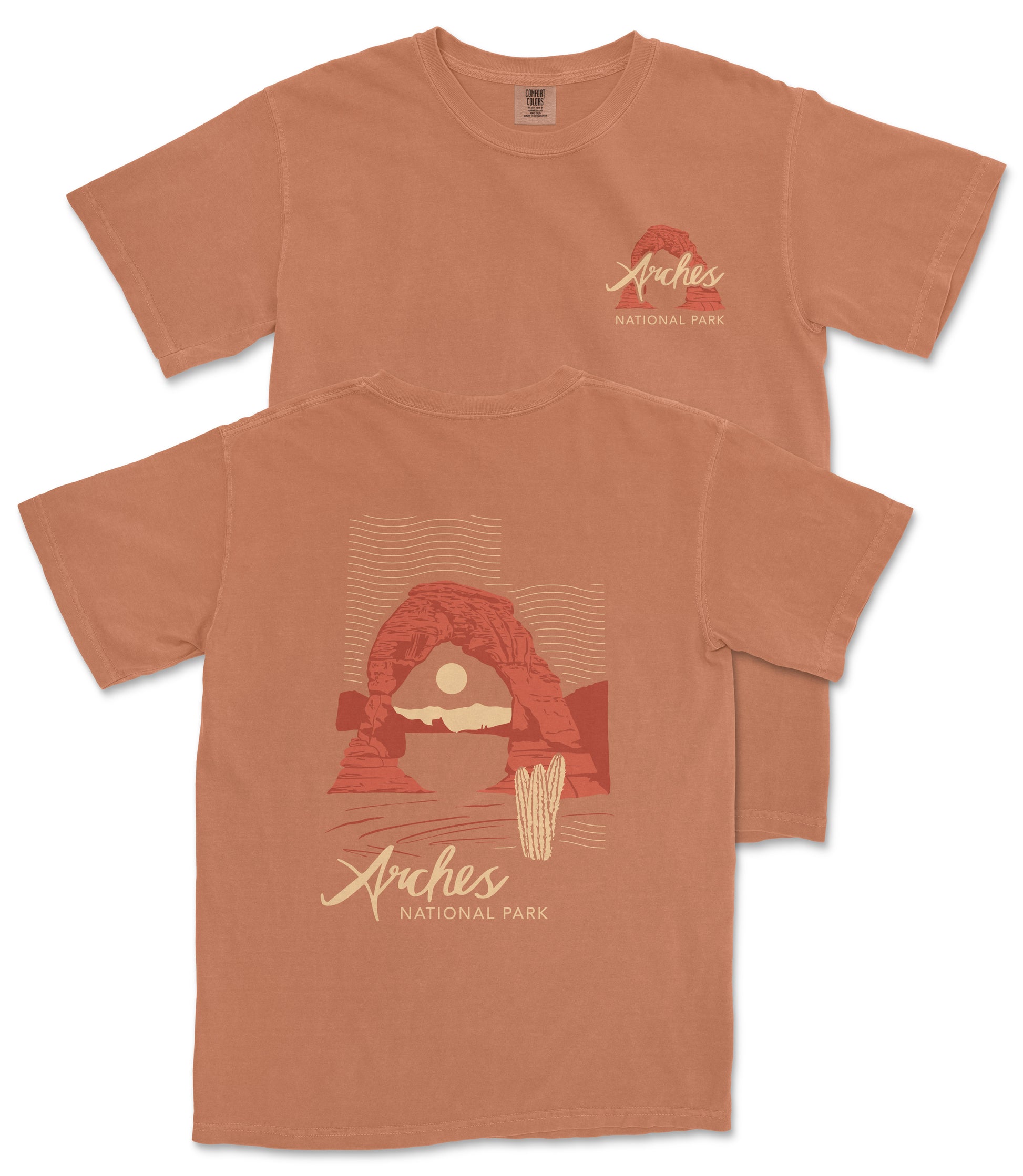 a t-shirt with a graphic design depicting a desert landscape with a red rock formation and a cactus. The text on the t-shirt reads "Arches National Park".