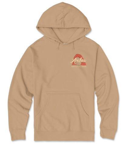 A beige hooded sweatshirt with a graphic design on the front.